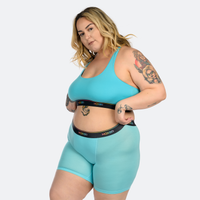 Claudia wears a size 3XL