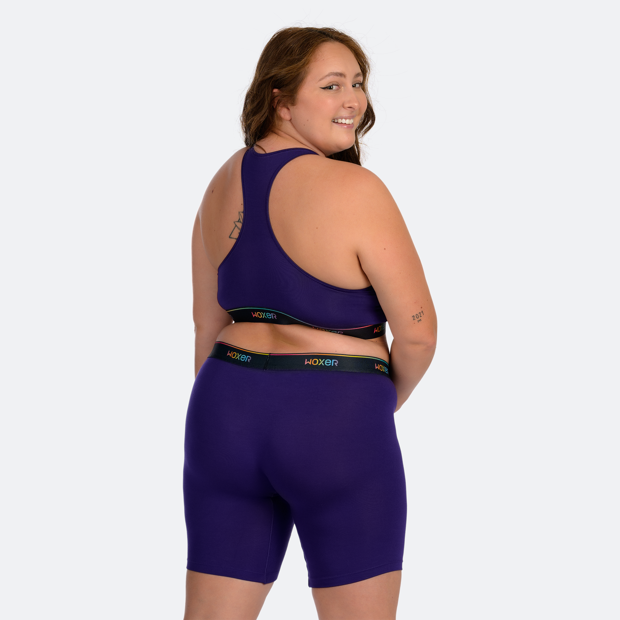 Trini wears a size XL