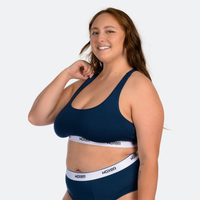 Trini wears a size XL