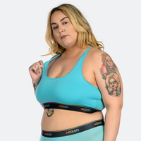 Claudia wears a size 3XL