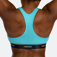 Ebony wears a size M