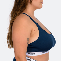 Trini wears a size XL