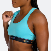 Ebony wears a size M