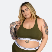 Claudia wears a size XL