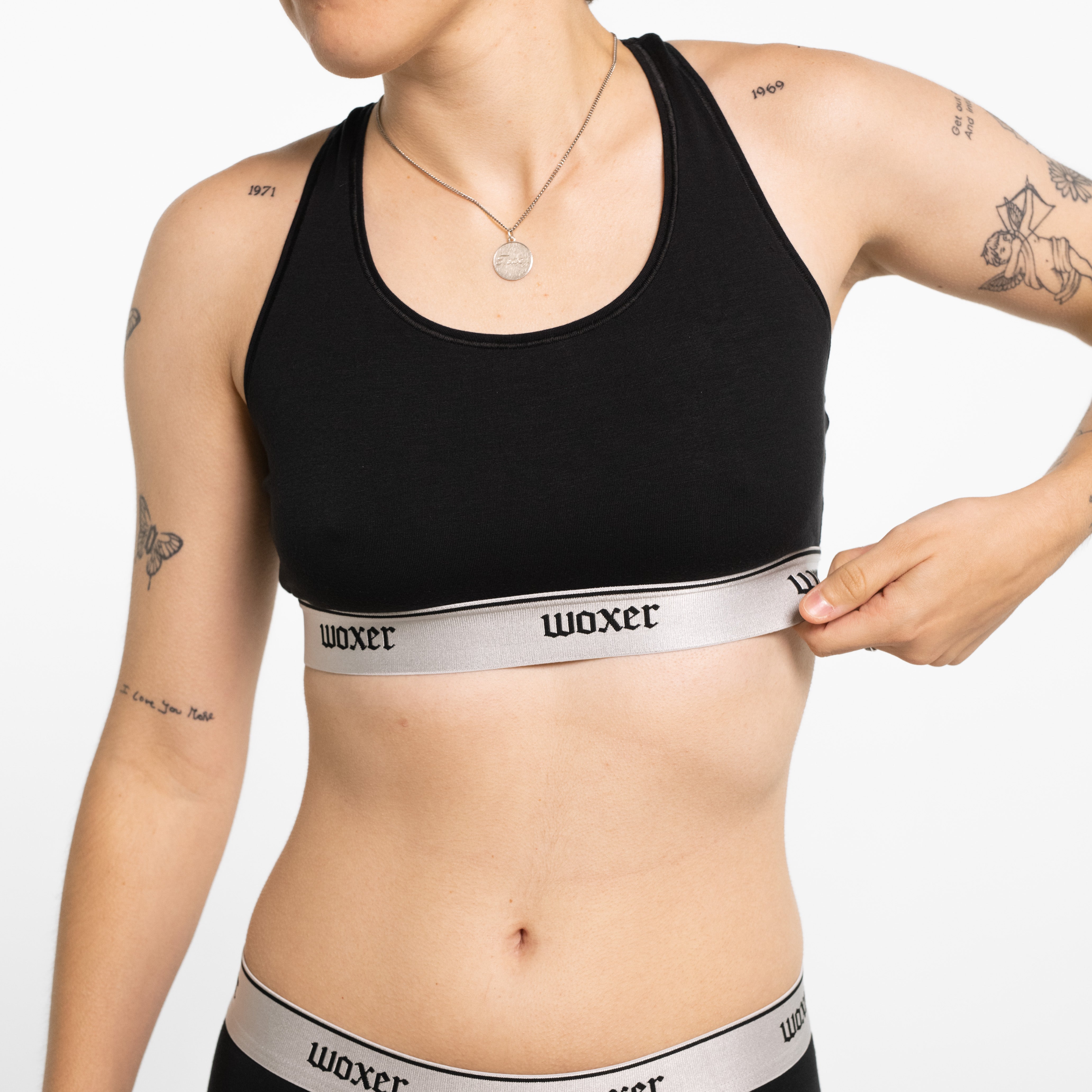 Gabbie wears a size M