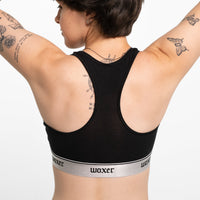 Gabbie wears a size M