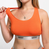 Michela wears a size M