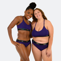 Ebony wears a size M, Trini wears a size XL