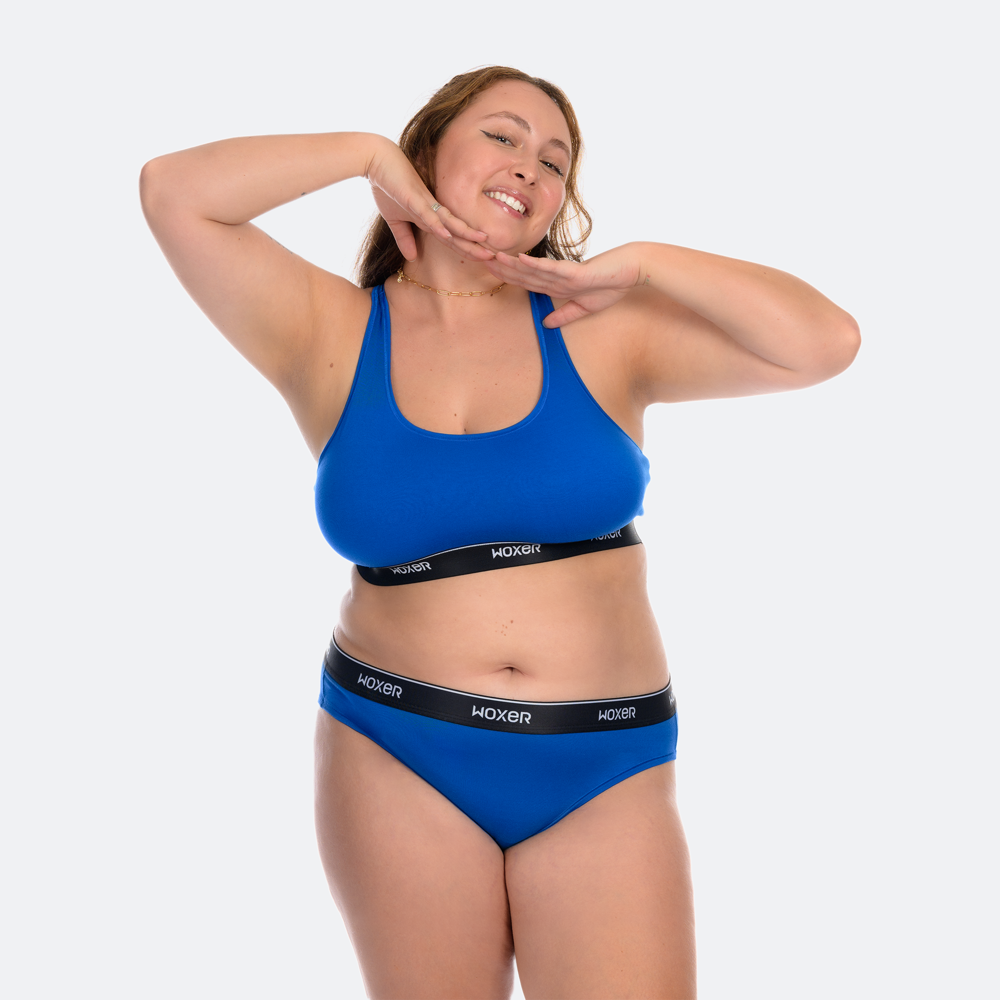 Trini wears a size XL