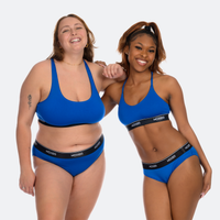 Trini wears a size XL, Niyah wears a size M