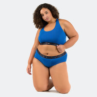 Jaadia wears a size 3XL