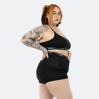 Claudia wears a size 3XL