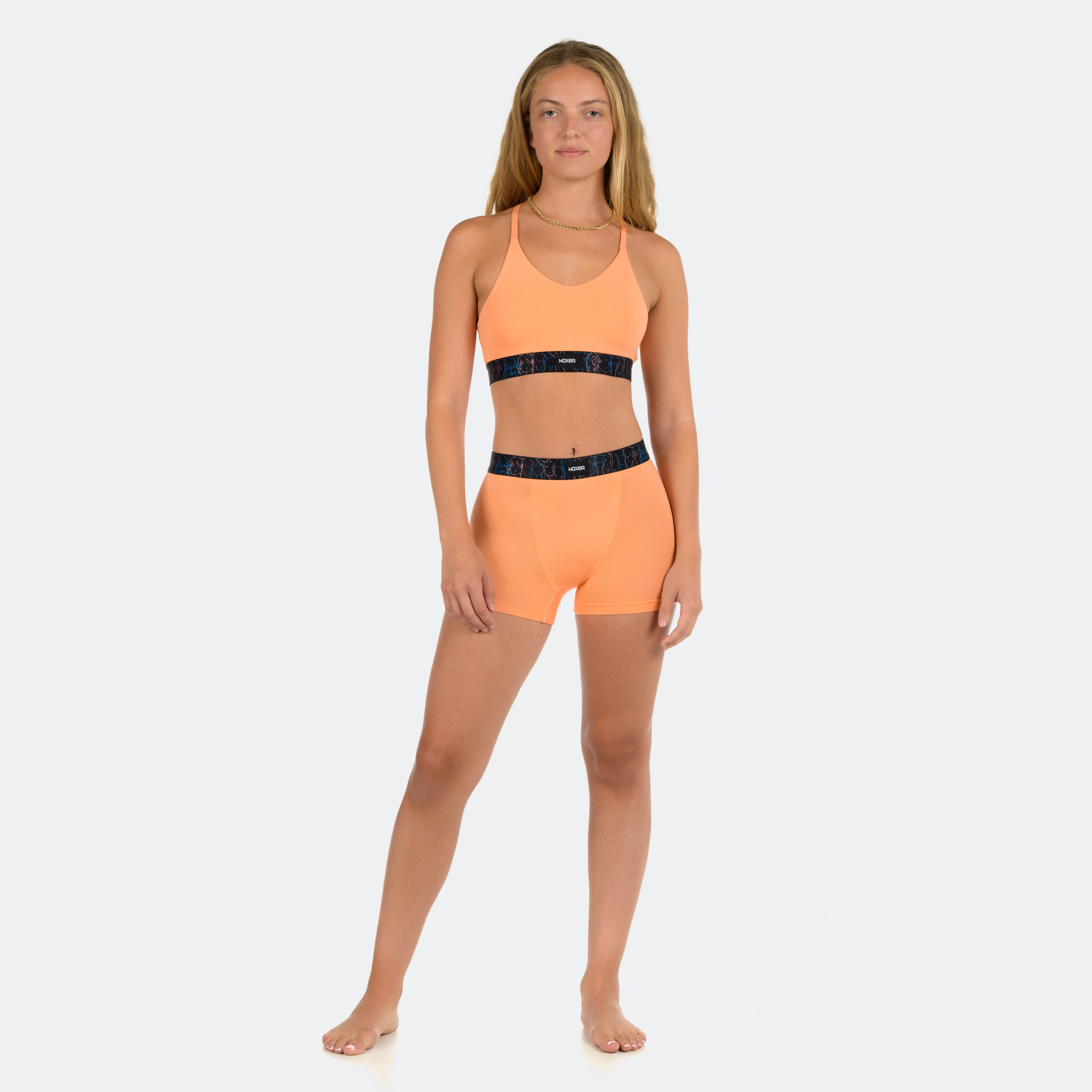 Angelica wears a size M