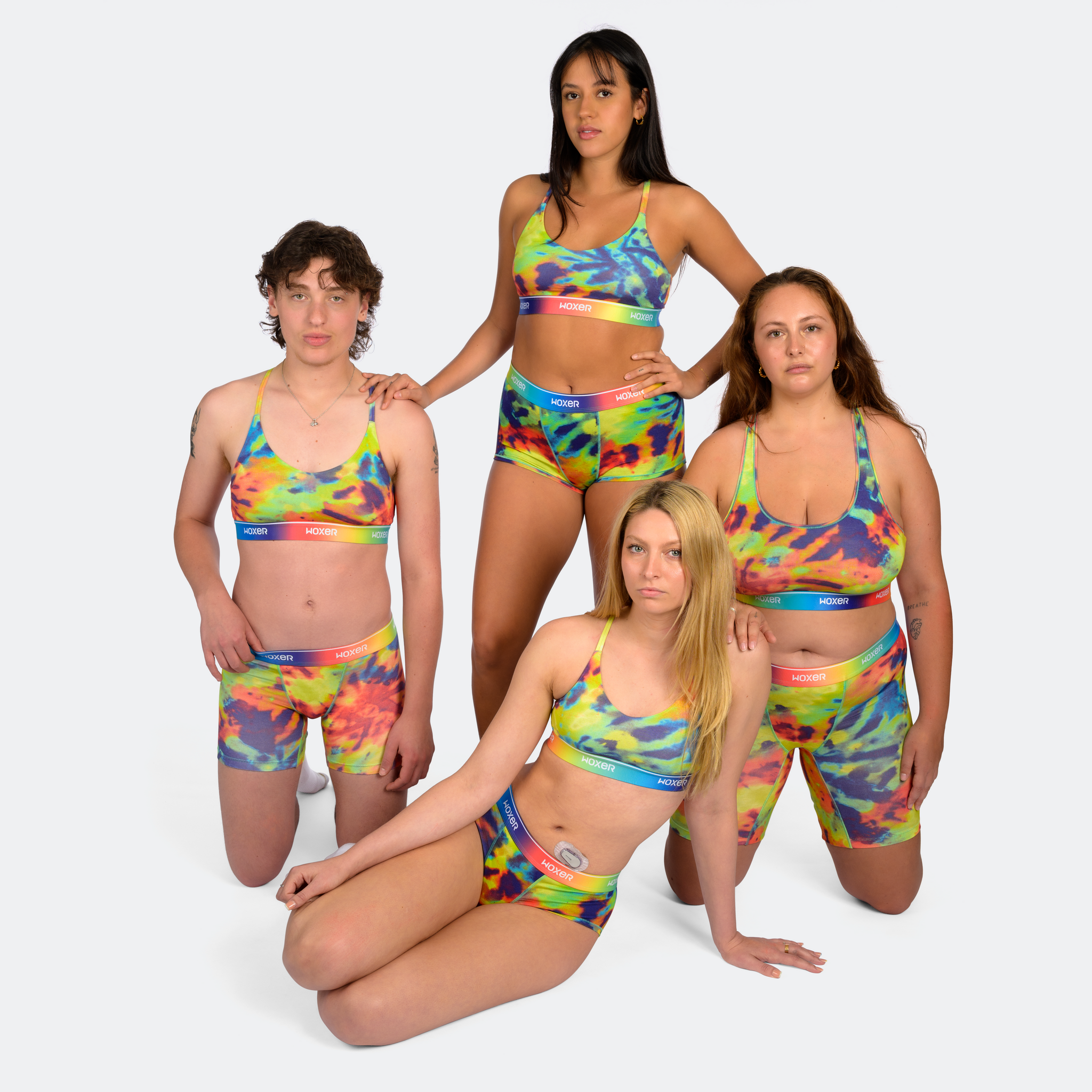 Julianna wears a size S, Kailey wears a size S, Carla wears a size L, Trini wears a size XL