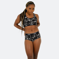 Ebony wears a size M