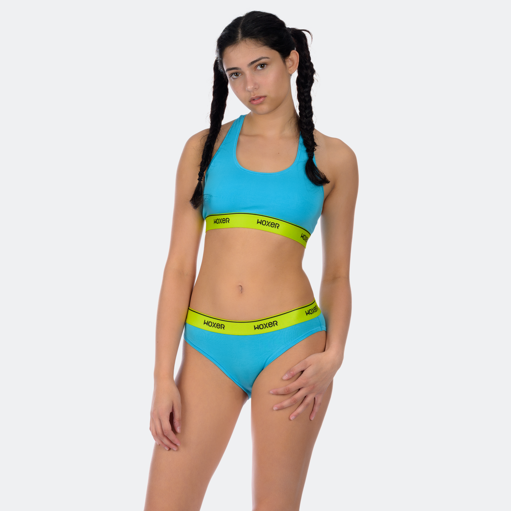Maya wears a size M